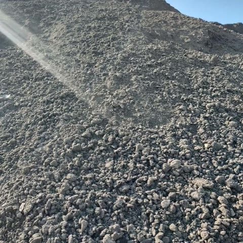 Gray crushed rock stockpile