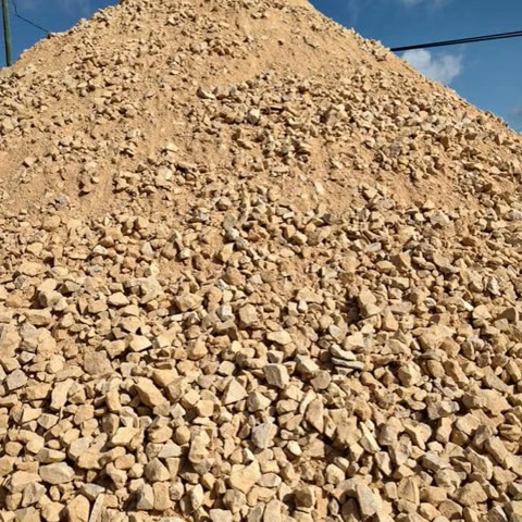 Tan crushed rock stockpile